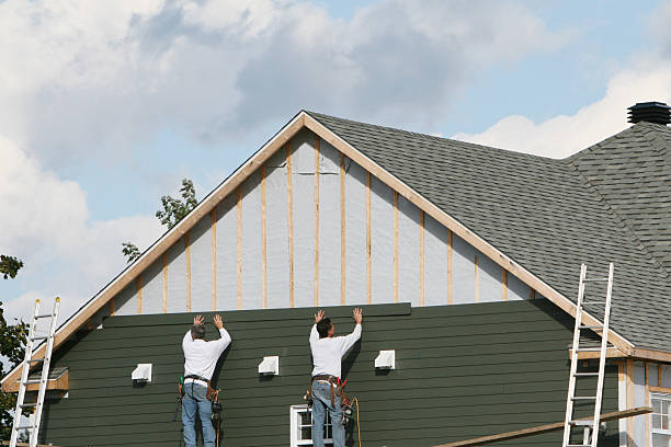 Professional Siding technician working in Owensville, IN